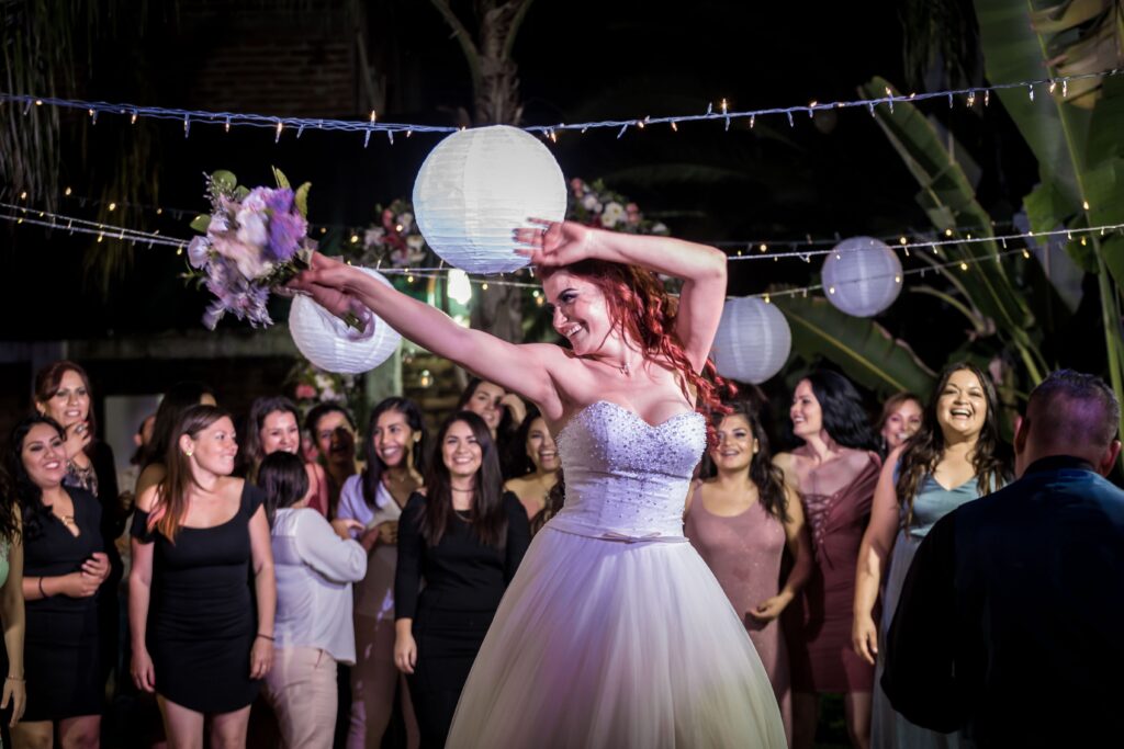 Bride dancing during reception at wedding