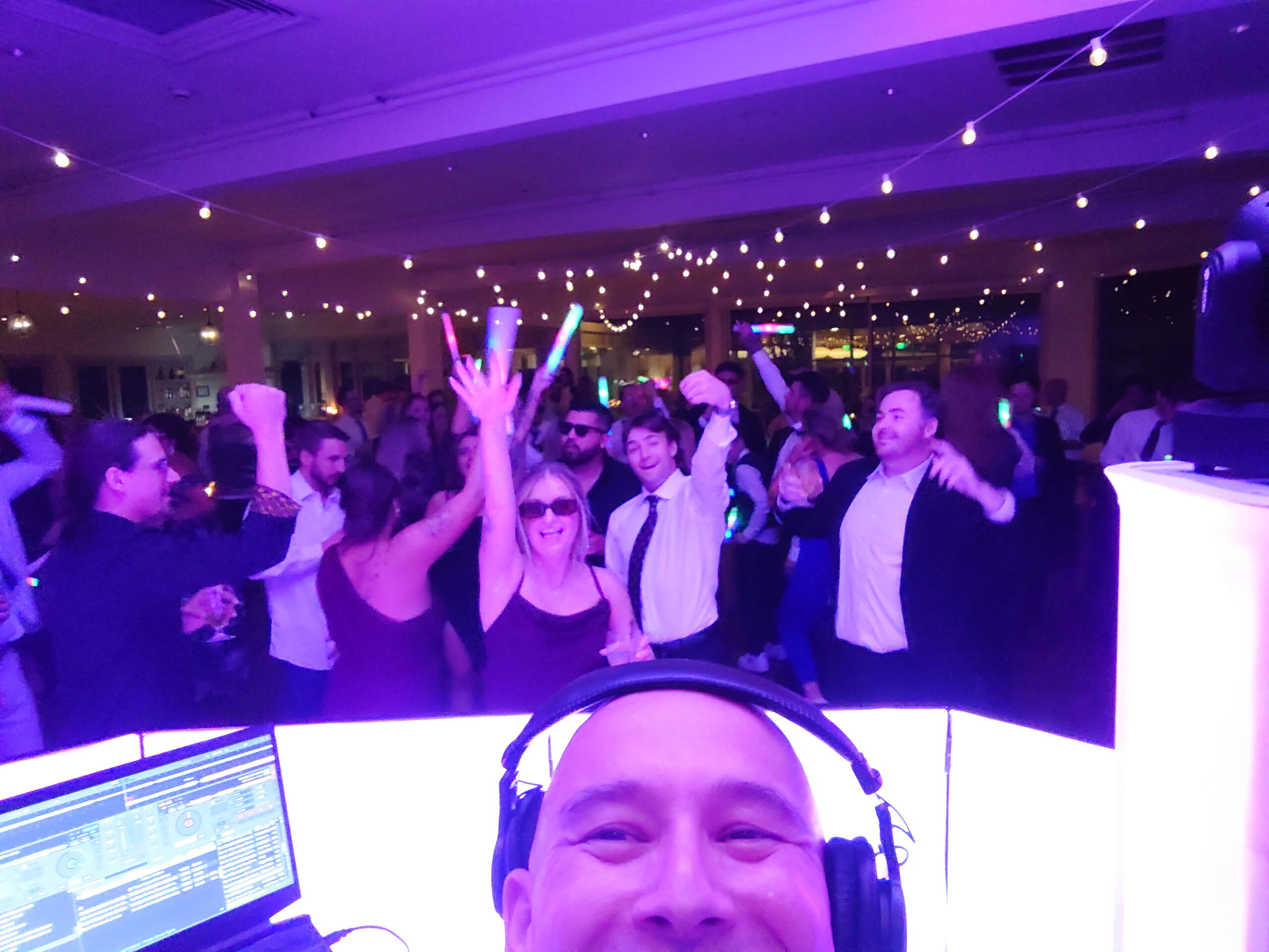 Happy wedding guests dancing | A Great Night Out Entertainment Wedding DJ Services